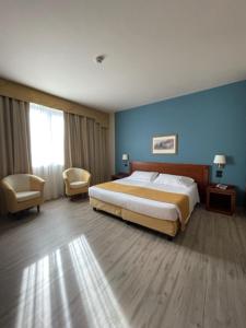 Posteľ alebo postele v izbe v ubytovaní Hotel Cavalieri