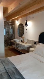 A bed or beds in a room at Relais Sant'Anna