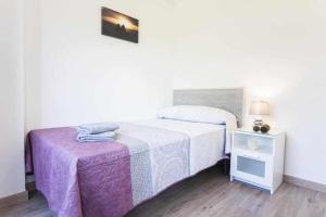 Łóżko lub łóżka w pokoju w obiekcie Cerca de Picasso y la Merced, Apartamento renovado