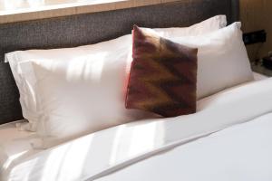 Letto o letti in una camera di Paco Hotel Canton Tower Pazhou