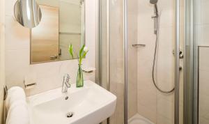Ένα μπάνιο στο Rasnerhof Ferienwohnung Meran