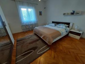 Posteľ alebo postele v izbe v ubytovaní Spacious apartment Ita - near beach (terrace, sea view)