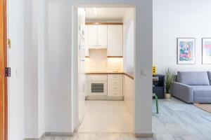 A kitchen or kitchenette at LU&CIA THYSSEN CITY CENTER
