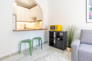 A kitchen or kitchenette at LU&CIA THYSSEN CITY CENTER