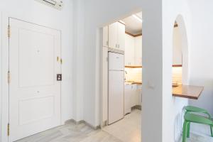 A kitchen or kitchenette at LU&CIA THYSSEN CITY CENTER