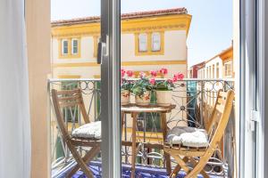 A balcony or terrace at LU&CIA THYSSEN CITY CENTER