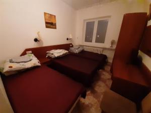 Posteľ alebo postele v izbe v ubytovaní OŚRODEK WYPOCZYNKOWY MAZOWSZE W KARPACZ