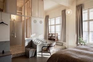 Postel nebo postele na pokoji v ubytování Michelberger Hotel + 37 fotografií
