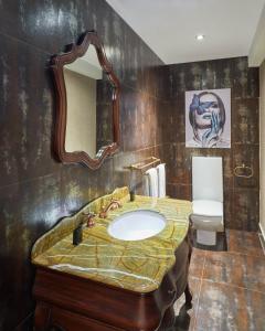 Ein Badezimmer in der Unterkunft Golden Park Hotel Cairo, Heliopolis