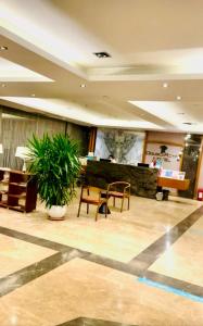 A seating area at DOUBLE ROYAL HOTEL Még 37 kép