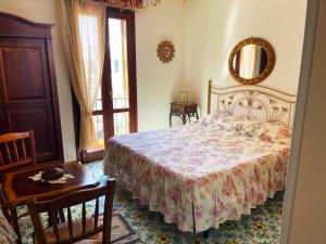 Giường trong phòng chung tại Guest House Al Gattopardo