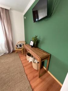 TV a/nebo společenská místnost v ubytování Gólyafészek Vendégház