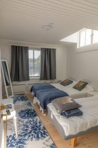 Vuode tai vuoteita majoituspaikassa Raahe Apartments