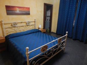 Ένα ή περισσότερα κρεβάτια σε δωμάτιο στο albergo massimo +6 φωτογραφίες