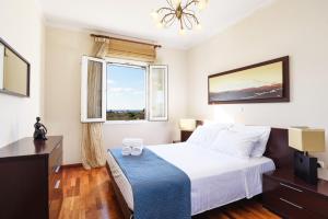 Postel nebo postele na pokoji v ubytování Villa Amarandes by Villa Plus + 27 fotografií