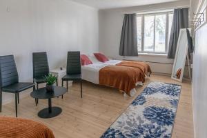 Vuode tai vuoteita majoituspaikassa Raahe Apartments