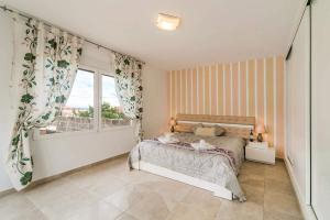 Postel nebo postele na pokoji v ubytování Villa Silvasol by Villa Plus