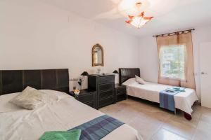Postel nebo postele na pokoji v ubytování Villa Silvasol by Villa Plus