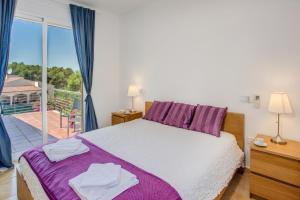 Posteľ alebo postele v izbe v ubytovaní Villa Magdalena Blanca by Villa Plus