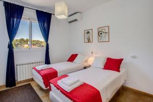 Posteľ alebo postele v izbe v ubytovaní Villa Magdalena Blanca by Villa Plus