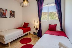 Posteľ alebo postele v izbe v ubytovaní Villa Magdalena Blanca by Villa Plus