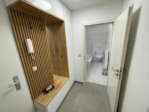 Koupelna v ubytování Hotel Bispinger Hof + 37 fotografií