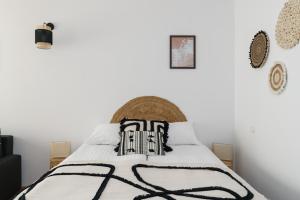 Posteľ alebo postele v izbe v ubytovaní Sleepway Apartments -Boho Chic