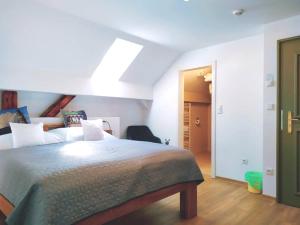 Postel nebo postele na pokoji v ubytování Hotel Garni Villa Areka