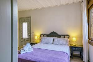 A bed or beds in a room at Apartamento Bajo 3