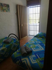 Postel nebo postele na pokoji v ubytování house scoglio di scibiliana