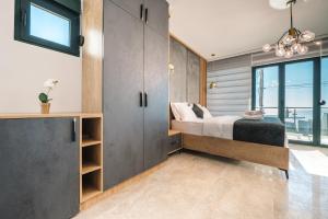 Postel nebo postele na pokoji v ubytování Barjaktar - Luxury Suites & SPA