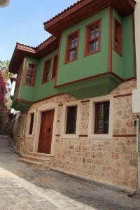 a house with a green at Leila old house in Antalya