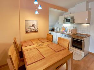 Kuchyň nebo kuchyňský kout v ubytování Villa Strandidyll - WG13 mit Meerblick