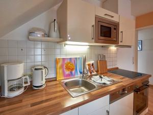 Kuchyň nebo kuchyňský kout v ubytování Villa Strandidyll - WG13 mit Meerblick