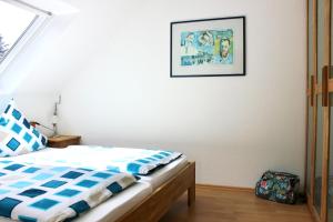 Säng eller sängar i ett rum på Haus Witten Höhen
