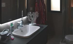 Ванна кімната в Residence Oleandri- Oleandro Rosso