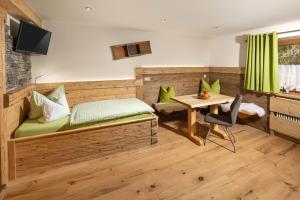 Ruang duduk di Gästehaus Kaltbachhäusl Garni