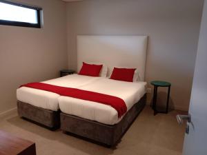 Ένα ή περισσότερα κρεβάτια σε δωμάτιο στο Zimbali Suites 619