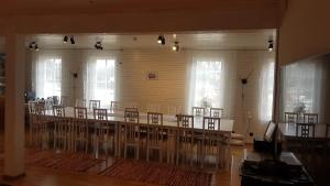 a large room with a bunch of chairs in it at Pähni külalistemaja in Rõuge
