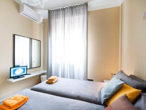 A bed or beds in a room at UR-NEST Borgo