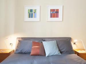 A bed or beds in a room at UR-NEST Borgo