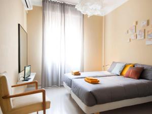 A bed or beds in a room at UR-NEST Borgo