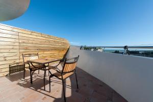 Rõdu või terrass majutusasutuses Discovery B&B