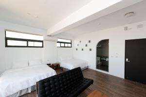 Voodi või voodid majutusasutuse Discovery B&B toas