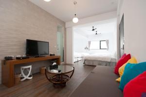 Televiisor ja/või meelelahutuskeskus majutusasutuses Discovery B&B