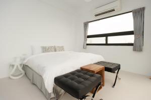 Voodi või voodid majutusasutuse Discovery B&B toas