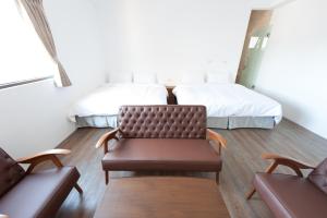 Voodi või voodid majutusasutuse Discovery B&B toas