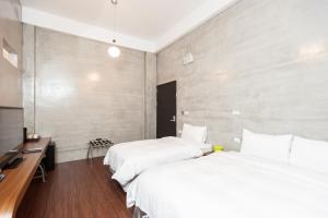 Voodi või voodid majutusasutuse Discovery B&B toas