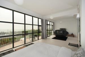 Voodi või voodid majutusasutuse Discovery B&B toas