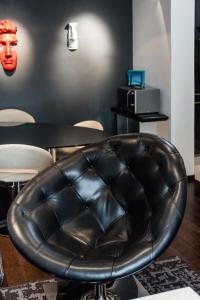 Posedenie v ubytovaní Art Gallery Apartment in Florence